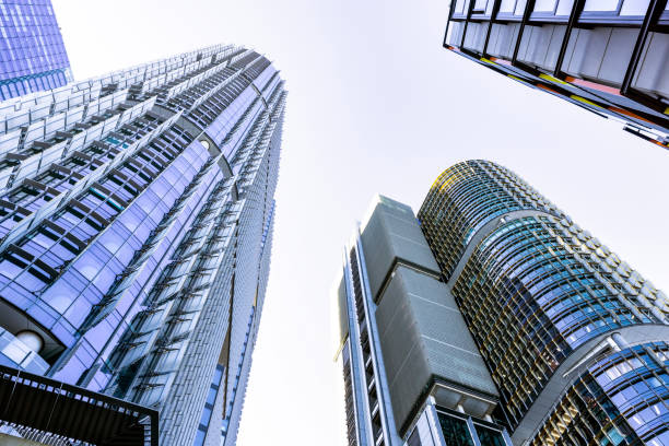 istock Low angle view of modern office buildings, skyscrapers, sky background with copy space 2162928008