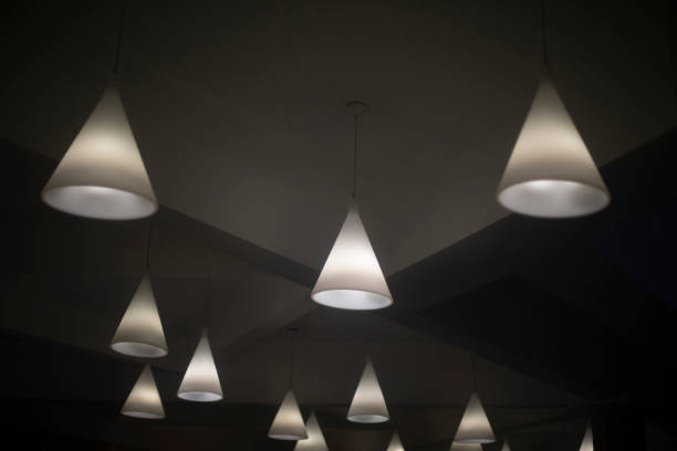 Lamps in interior. Light in room. Ceiling in apartment. Light design.