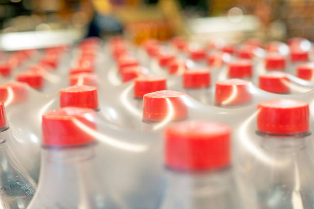 istock drinks packaged in plastic containers and wrapped in thick film in a supermarket 2162936653