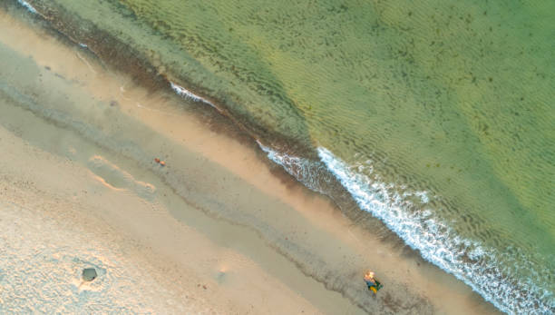istock sea and beach from above 2162939575
