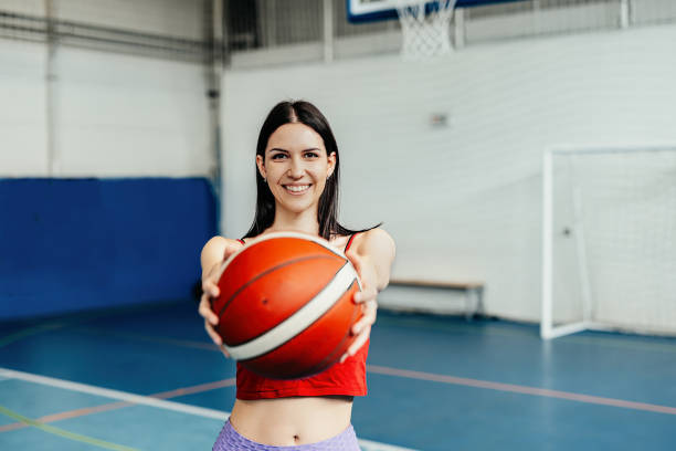 istock A woman holding a basketball 2162941006