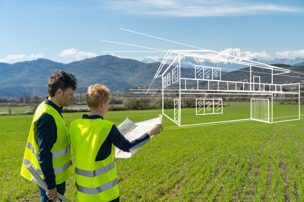 istock A couple planning a new house against a moutain backdrop 2162945877