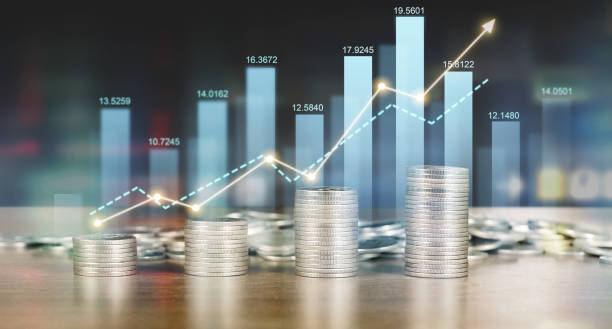 istock Stack of coin with trading graph, financial investment concept 2162956504