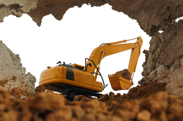 istock Excavator in the construction site. With through the tunnel 2162956571
