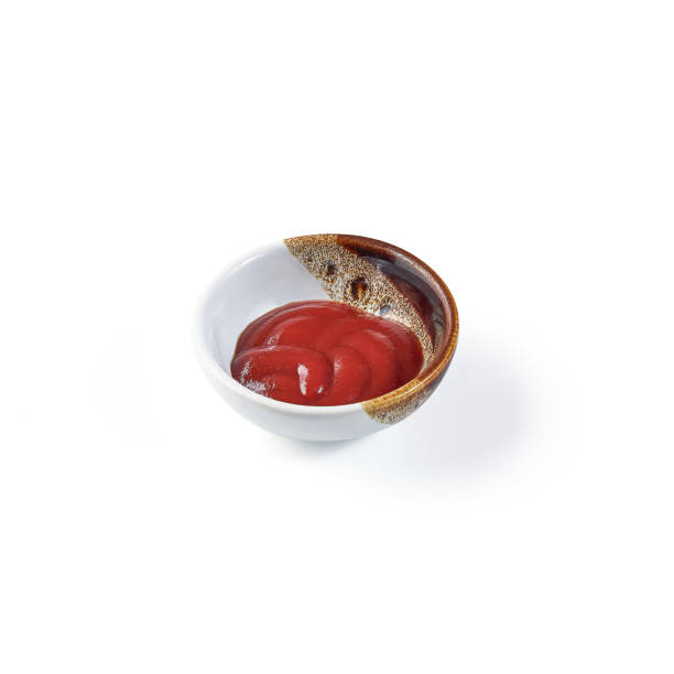istock Ketchup (dipping tomato sauce) in a white cup isolated on white background. 2162957632