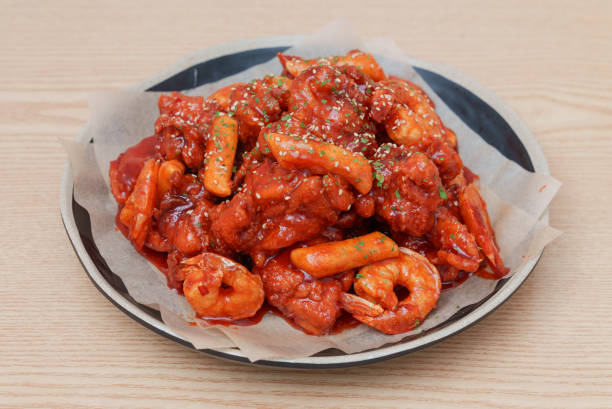 Korean food side dish - fried Shrimps on wooden table.