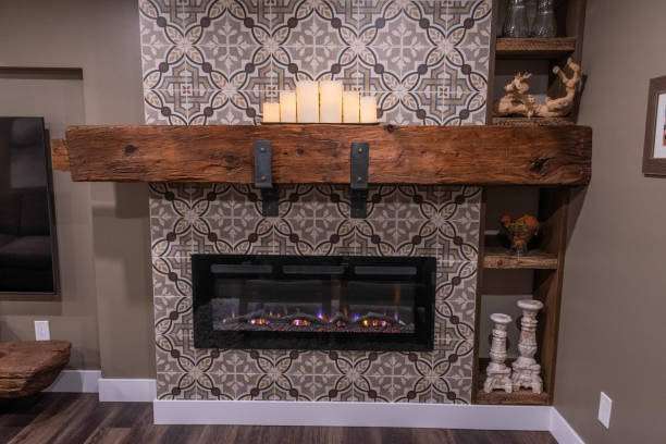 istock Electric fireplace with reclaimed beam for mantel and decorative ceramic tile 2162959875