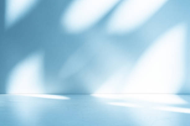 istock Studio style background wall decoration presentation uses white and blue tones. with shadows cast from a nearby window, concept creating a decorative 2162960049
