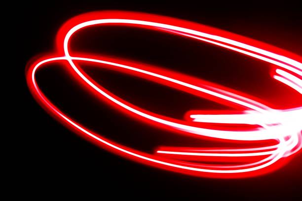 istock Blurred red neon lights.  Overlay of colored light.  Disco lighting.  Soft texture of unfocused red ultraviolet light on dark abstract empty space background 2162964314