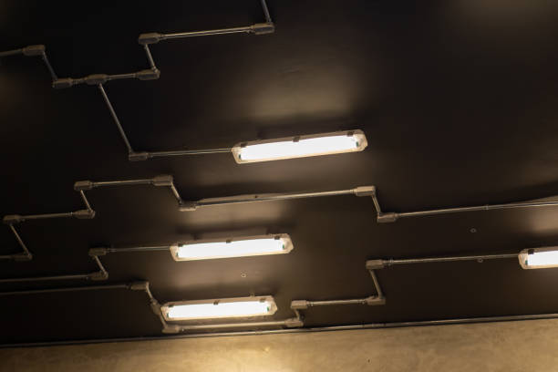 istock Illuminating Architectural Design:Abstract Geometric Ceiling Lights in Industrial Interior 2162966888