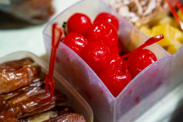 Close-up of cherries with water droplets