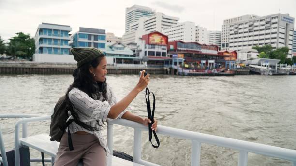 istock Asian woman taking pictures 2162967612