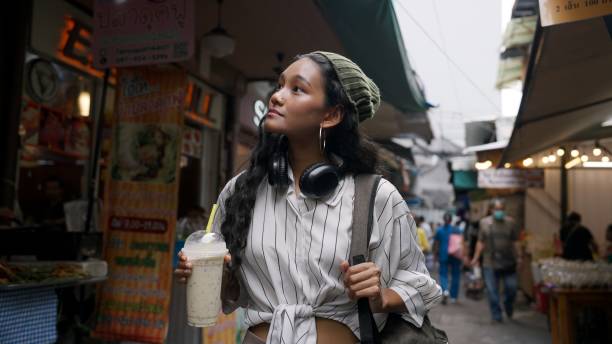 istock woman walking in local places 2162967641