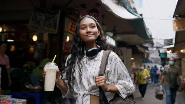 istock woman walking in local places 2162967644