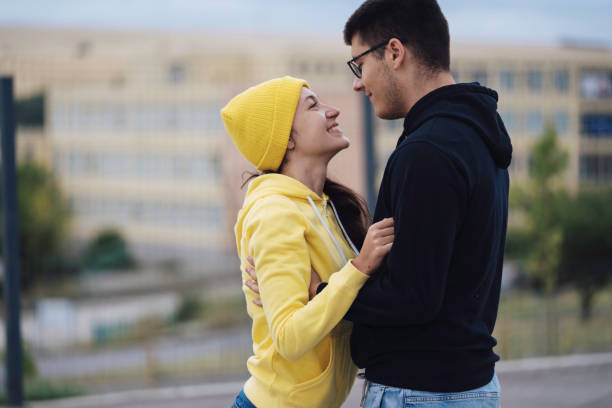 istock Young couple sharing an intimate moment skate park 2162970270