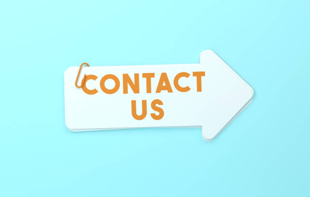 Contact Us Written Arrow Shaped Sticky Notes On Blue Background. Direction Concept.