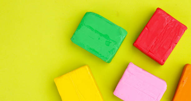 istock Colorful plasticine clay on green background. 2162971000