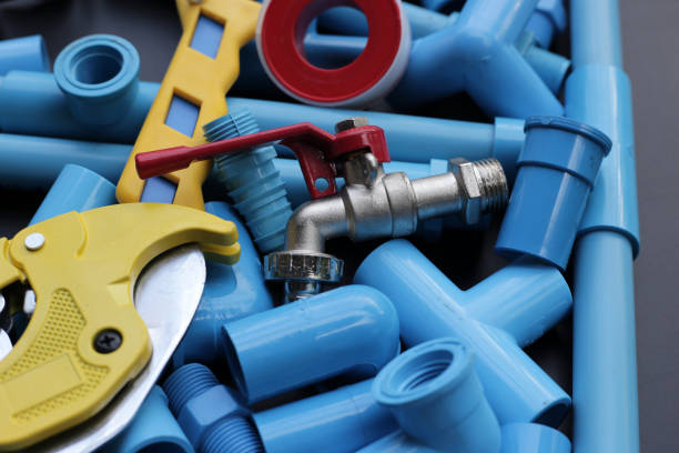 istock Plumber equipment with blue pvc pipe connections for plumbing work. 2162972332