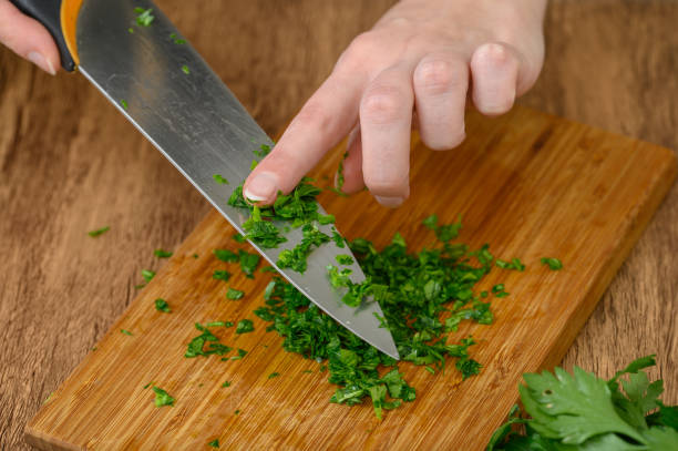 istock Chop the parsley leaves into small pieces 2162972737