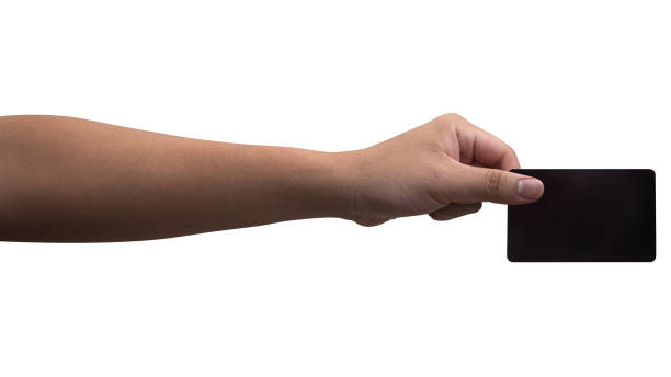 istock The man's hand holds a black card isolated on white background. 2162973926
