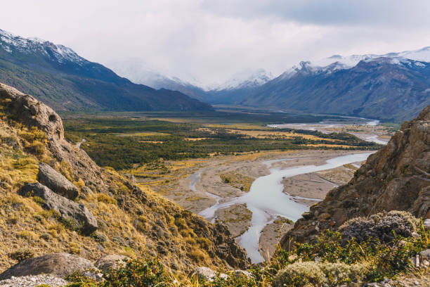 istock A mountain range with a river running through it in patagonia 2162974562