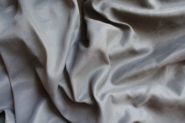 istock simple unprinted grey polyamide fabric in soft folds 2162975885