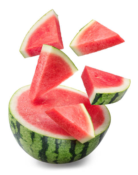 istock Watermelon slices falling down over the half of watermelon isolated on white background. File contains clipping paths. 2162976147