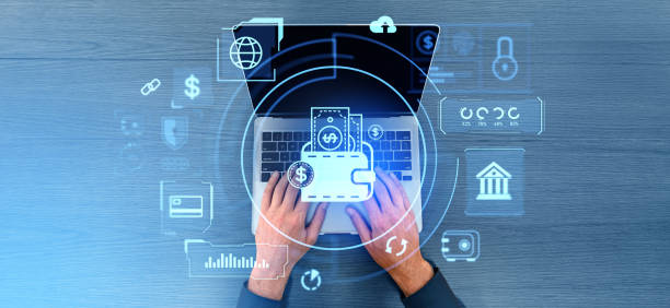 istock Man using laptop, digital wallet with financial icons hologram, e-commerce 2162976795