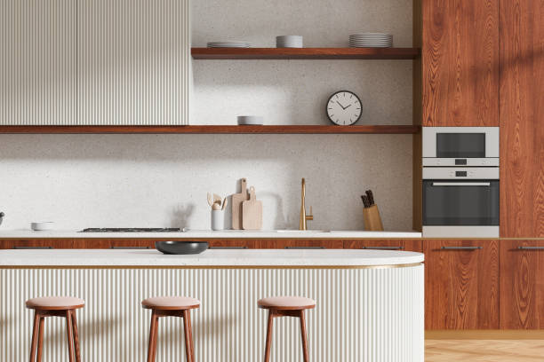 istock Wooden home kitchen interior with bar counter and stool, cooking cabinet 2162977573