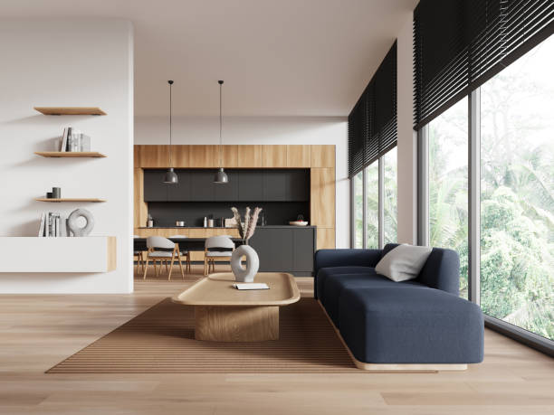 istock Modern flat studio interior with cooking and lounge zone with couch and window 2162977735