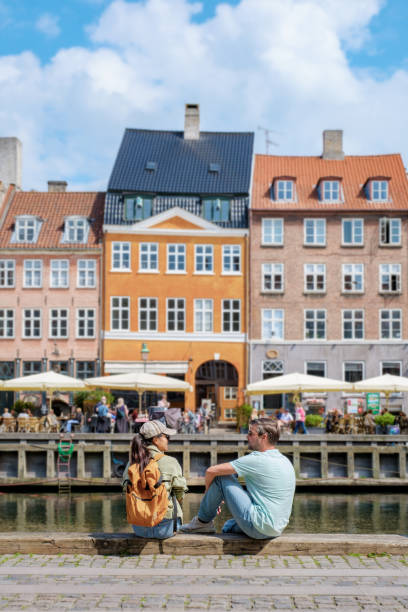 istock Couple Relaxing by Copenhagen Canal 2162978968
