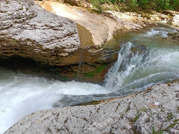 istock The river flows into the gorge. Beauty is in nature. 2162980223