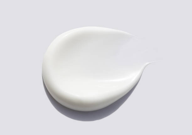 istock cosmetic smear of creamy texture on gray background 2162980896