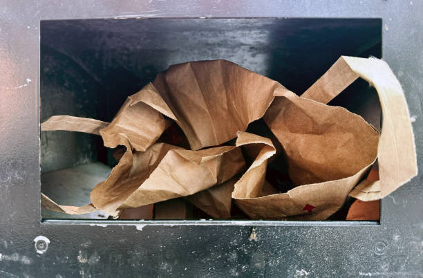 A plastic junk box or trash bin with \