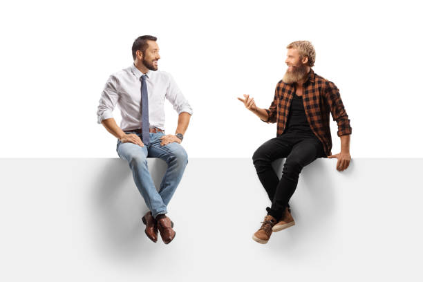istock Businessman and casual man sitting on a panel and discussing 2162981884