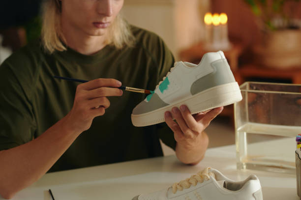 istock Fashion Designer Making Custom Sneakers 2162982397
