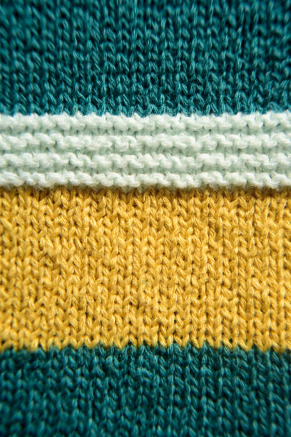 Green, white and yellow wool textile detail