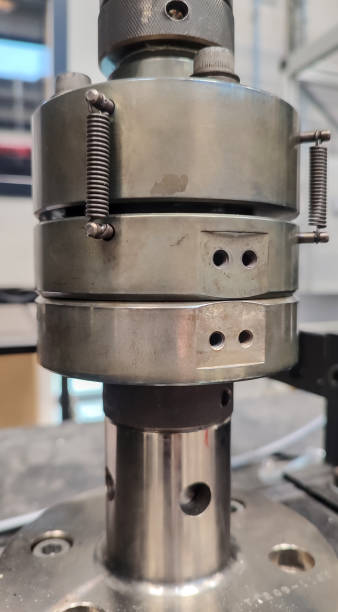 istock Close up of compression plates, on a compression bench, for mechanical tests. 2162987707