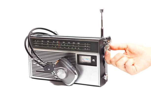 istock Hand tuning radio receiver button. 2162990892