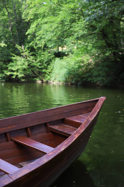 wooden rowing boats in Black Lake in Durmitor National Park, a few minutes from the center of Žabljak; Žabljak, Montenegro