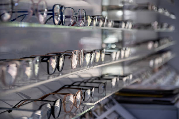 istock medical eyeglasses are presented on shelf for selling with light reflection on it is lens 2162997030