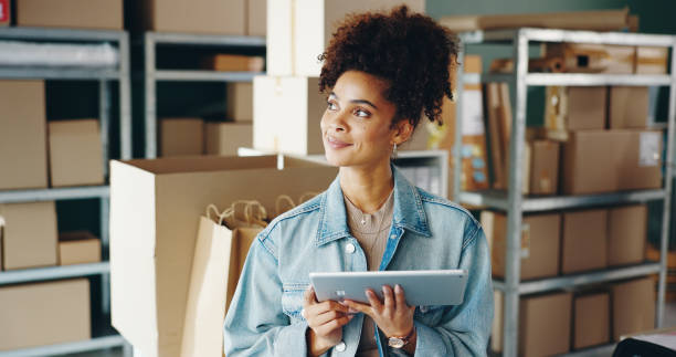 istock Boxes, thinking and woman with tablet, business and employee with decision, problem solving and solution. Problem solving, entrepreneur or industry with tech, cardboard or logistics order with choice 2162997522