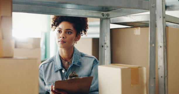 istock Woman, inspection and warehouse with boxes or inventory, quality control for freight distribution. Female person, logistics and wholesale supplier with stock checklist, clipboard for supply chain 2162997528