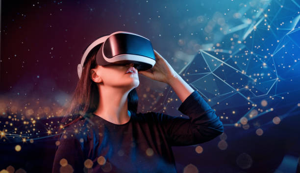 istock Woman with VR virtual reality goggles 2162998798
