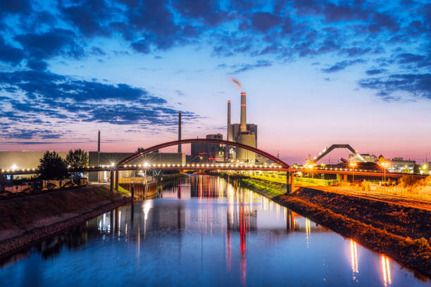 istock Industrial Landscape at Sunset with Bridge and River in Germany 2163000018