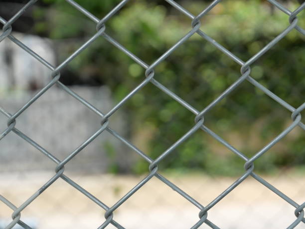 istock Stell fence with blur background or texture. 2163001089