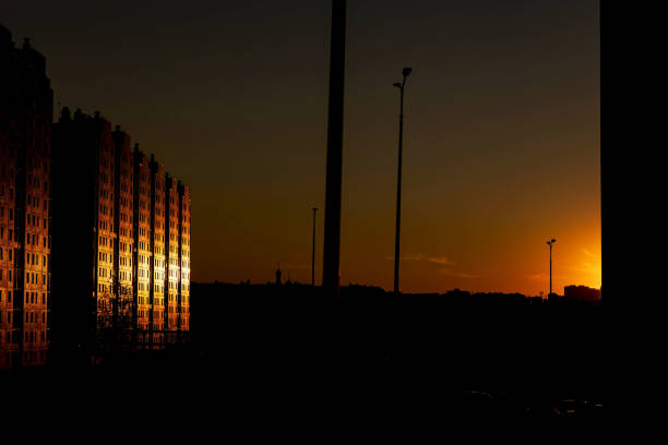 Sunlight from the setting sun on a multi-storey apartment building