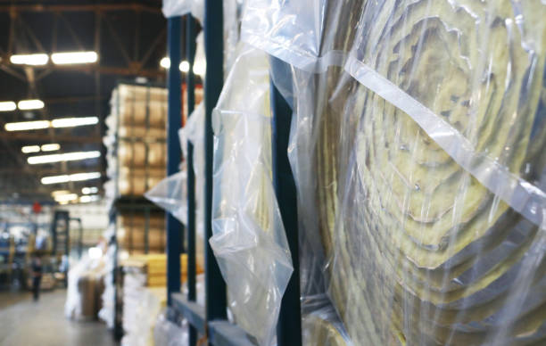 istock Fiberglass insulation roll in plastic cover bag. 2163002032