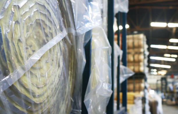 istock Fiberglass insulation material roll in plastic cover bag. 2163002039