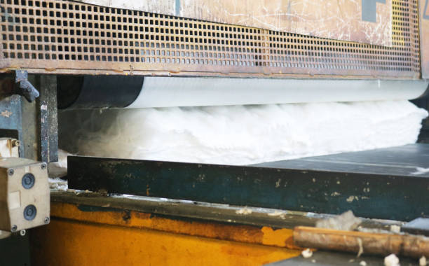 Silica fiberglass needle on automatic conveyor cutting machine.